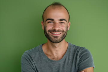 Obraz premium A close up portrait of a young man with a subtle smile