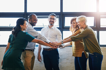 Hands, huddle and businesspeople or team in office for synergy, diversity and collaboration with...