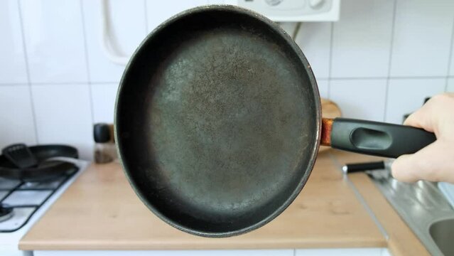 the frying pan on which the top non-stick layer of Teflon was damaged
