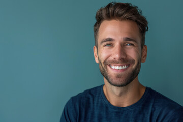 Fototapeta premium A close up portrait of a young man with a subtle smile