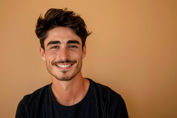 Obraz premium A close up portrait of a young man with a subtle smile