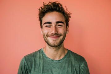 Fototapeta premium A close up portrait of a young man with a subtle smile