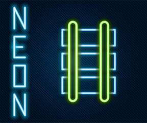 Glowing neon line Toy railway, railroad track icon isolated on black background. Colorful outline concept. Vector