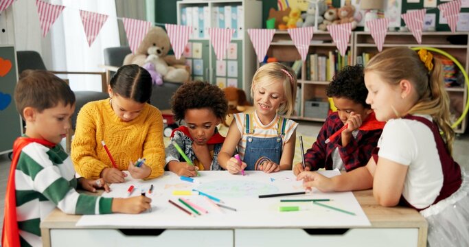Children, group and friends or drawing in classroom for creativity education, teamwork or project. Boys, girls and coloring pencil at desk for back to school art lesson or development, talk or youth