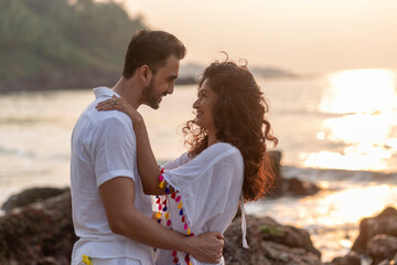 couple kissing on the beach