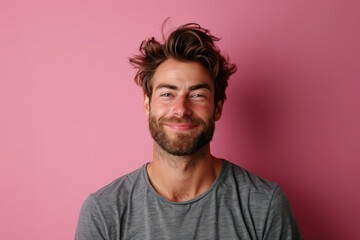 Obraz premium A close up portrait of a young man with a subtle smile