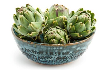 Obraz premium Artichokes in Ceramic Bowl