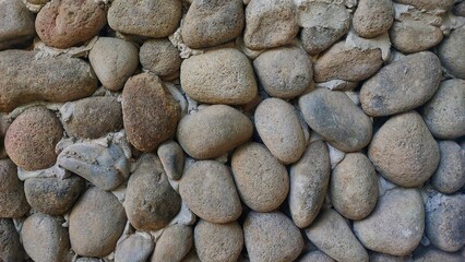 bricks wall rounded stones texture