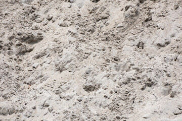 Pile of white sand texture background. Natural sand pattern outside.