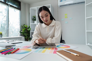 Focused Asian Woman Working on Graphic Design Project, Indoors Concept of creative professional and...