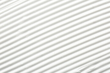 Obraz premium Texture of face care cream as background, top view