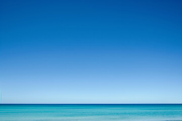 The clear blue sky without clouds. A natural background for images. Sea.