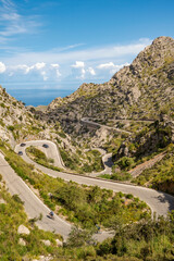 The winding Sa Calobra road surrounded by spectacular landscape and sea views in the west coast of Majorca, Balearic Islands, Spain