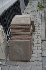 construction tiles on the sidewalk near the building.repair of roads ond sidewalks