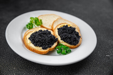 lumpfish caviar seafood black caviar natural fresh appetizer meal food snack on the table copy space food background rustic top view