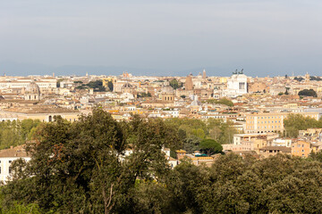 Obraz premium Rome, Italy - April 11, 2024: Rome, Italy - April 11, 2024: Aerial view of the city of Rome from one of the viewpoints on the hills in Rome, Italy