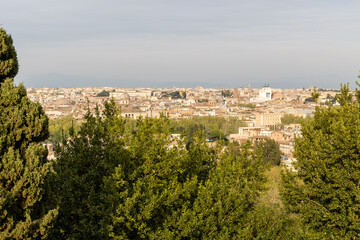 Fototapeta premium Rome, Italy - April 11, 2024: Rome, Italy - April 11, 2024: Aerial view of the city of Rome from one of the viewpoints on the hills in Rome, Italy