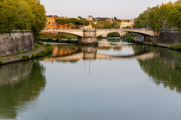 Rome, Italy - April 11, 2024: Rome, Italy - April 11, 2024: Views of the Tiber River as it passes...