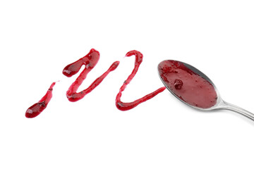 Tasty sweet jam and spoon isolated on white