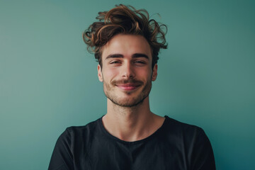 Obraz premium A close up portrait of a young man with a subtle smile