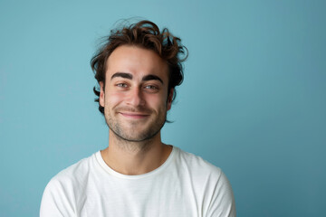 Fototapeta premium A close up portrait of a young man with a subtle smile