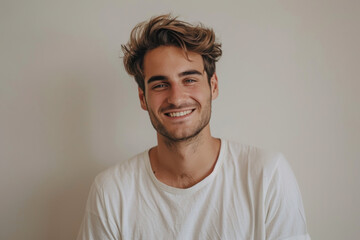 Obraz premium A close up portrait of a young man with a subtle smile