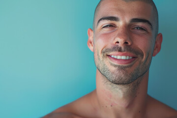 Fototapeta premium A close up portrait of a young man with a subtle smile