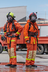 Fototapeta premium Firefighter Team Training with Various Tools in Professional Gear