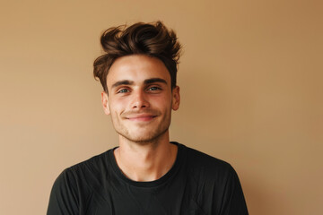Obraz premium A close up portrait of a young man with a subtle smile
