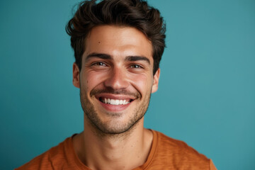 Fototapeta premium A close up portrait of a young man with a subtle smile