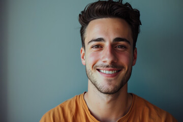 Obraz premium A close up portrait of a young man with a subtle smile