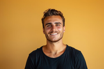 Fototapeta premium A close up portrait of a young man with a subtle smile
