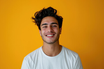 Fototapeta premium A close up portrait of a young man with a subtle smile