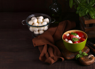 salad with tomatoes and mini mozzarella cheese