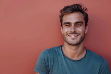 Fototapeta premium A close up portrait of a young man with a subtle smile