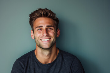Obraz premium A close up portrait of a young man with a subtle smile