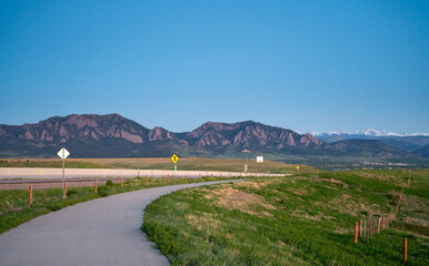 The Flatiron mountains and blue sky at night in summer.  Boulder Colorado United States.