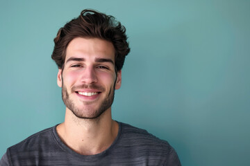 Obraz premium A close up portrait of a young man with a subtle smile