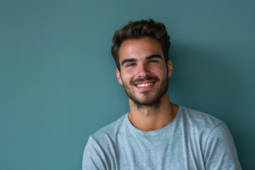 Fototapeta premium A close up portrait of a young man with a subtle smile