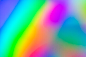 Abstract blur holographic rainbow foil iridescent background