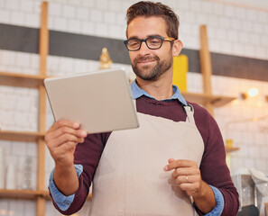 Coffee shop, restaurant and man on tablet for online menu, checking stock and product inventory. Barista, cafeteria and small business owner on digital tech for internet, networking and website order