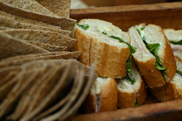 sliced ​​bread, Italian bread, loaves on the table, loaves on wooden tray, breakfast table
