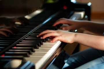 Obraz premium Close-up of a person playing a piano, highlighting finger placement and the keys in detailed focus.
