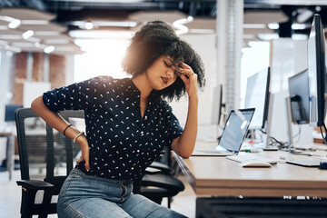 Black woman, headache or back pain with injury in stress, anxiety or depression for strain or posture at office. Tired African, female person or employee with sore spine, ache or tension at workplace