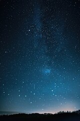 A dark blue sky filled with twinkling stars and recognizable constellations, perfect for use in designs about astronomy, space exploration or science education