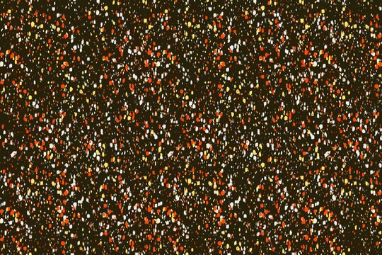 Abstract colorful speckled pattern on a dark backdrop