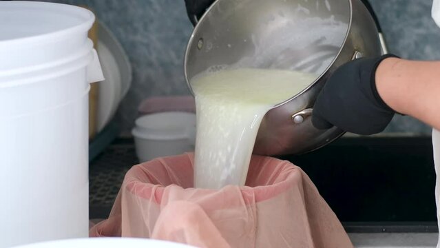 To prepare cottage cheese, strain a suspension of fermented milk heated over fire through cheesecloth. Cottage cheese