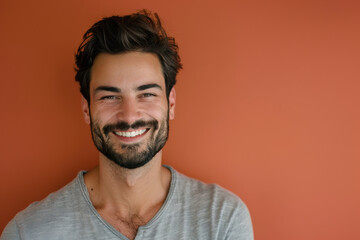 Fototapeta premium A close up portrait of a young man with a subtle smile