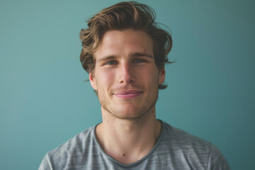 Fototapeta premium A close up portrait of a young man with a subtle smile