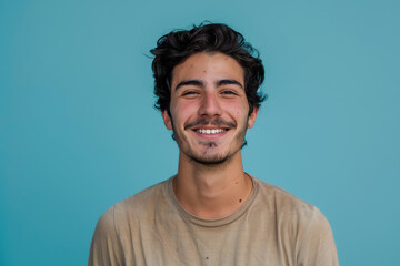 Obraz premium A close up portrait of a young man with a subtle smile
